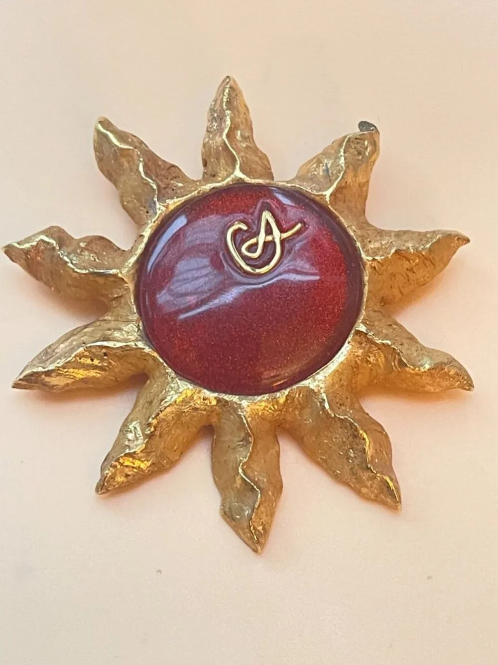 Christian Lacroix Gold-Tone Sun Brooch W/ Red Resin Center & Golden Logo